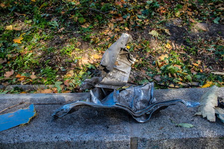 Aftermath of massive Russian missile attacks, remains of the missile that hit a public garden near the Friendship Arch of Kyiv in the city center. Missiles hit in 4 places in the city of Kyiv. 9 people died and 36 people were injured. Russia threatens morのeditorial素材