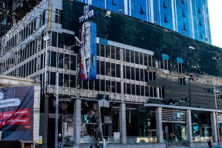 Aftermath of massive Russian missile attacks, an office building near the train station was hit hard. Missiles hit in 4 places in the city of Kyiv. 9 people died and 36 people were injured. Russia threatens more strikes after missiles hit cities across Ukのeditorial素材