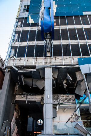 Aftermath of massive Russian missile attacks, an office building near the train station was hit hard. Missiles hit in 4 places in the city of Kyiv. 9 people died and 36 people were injured. Russia threatens more strikes after missiles hit cities across Ukのeditorial素材