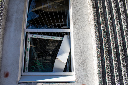 Aftermath of massive Russian missile attacks, facade of historical buildings in downtown Kyiv was hit hard. Missiles hit in 4 places in the city of Kyiv. 9 people died and 36 people were injured. Russia threatens more strikes after missiles hit cities acrのeditorial素材