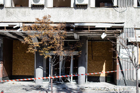 Aftermath of massive Russian missile attacks, facade of historical buildings in downtown Kyiv was hit hard. Missiles hit in 4 places in the city of Kyiv. 9 people died and 36 people were injured. Russia threatens more strikes after missiles hit cities acrのeditorial素材