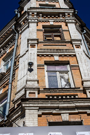 Aftermath of massive Russian missile attacks, facade of historical buildings in downtown Kyiv was hit hard. Missiles hit in 4 places in the city of Kyiv. 9 people died and 36 people were injured. Russia threatens more strikes after missiles hit cities acrのeditorial素材
