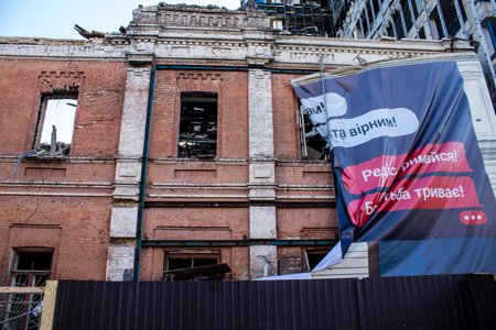 Aftermath of massive Russian missile attacks, facade of historical buildings in downtown Kyiv was...