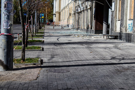 Aftermath of massive Russian missile attacks, facade of historical buildings in downtown Kyiv was hit hard. Missiles hit in 4 places in the city of Kyiv. 9 people died and 36 people were injured. Russia threatens more strikes after missiles hit cities acrのeditorial素材