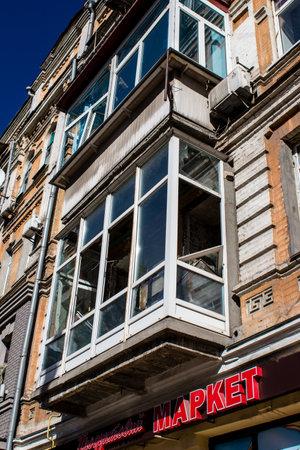 Aftermath of massive Russian missile attacks, facade of historical buildings in downtown Kyiv was hit hard. Missiles hit in 4 places in the city of Kyiv. 9 people died and 36 people were injured. Russia threatens more strikes after missiles hit cities acrのeditorial素材
