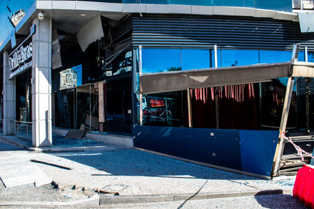 Aftermath of massive Russian missile attacks, an office building near the train station was hit hard. Missiles hit in 4 places in the city of Kyiv. 9 people died and 36 people were injured. Russia threatens more strikes after missiles hit cities across Ukのeditorial素材