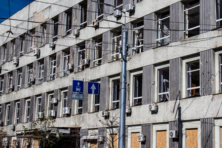 Aftermath of massive Russian missile attacks, facade of historical buildings in downtown Kyiv was hit hard. Missiles hit in 4 places in the city of Kyiv. 9 people died and 36 people were injured. Russia threatens more strikes after missiles hit cities acrのeditorial素材