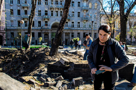 Aftermath of massive Russian missile attacks, a public garden in the city center was hit hard. Missiles hit in 4 places in the city of Kyiv. 9 people died and 36 people were injured. Russia threatens more strikes after missiles hit cities across Ukraineのeditorial素材