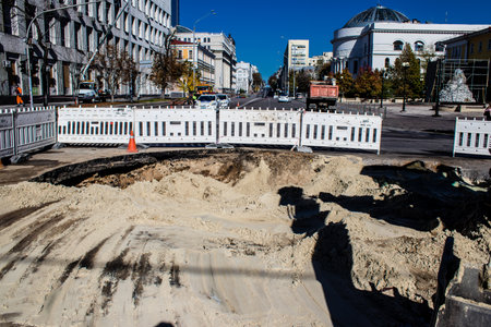 Aftermath of massive Russian missile attacks, a main road in downtown Kyiv was hit hard. Missiles hit in 4 places in the city of Kyiv. 9 people died and 36 people were injured. Russia threatens more strikes after missiles hit cities across Ukraineのeditorial素材