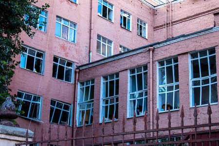 Aftermath of massive Russian missile attacks, facade of historical buildings in downtown Kyiv was hit hard. Missiles hit in 4 places in the city of Kyiv. 9 people died and 36 people were injured. Russia threatens more strikes after missiles hit cities acrのeditorial素材