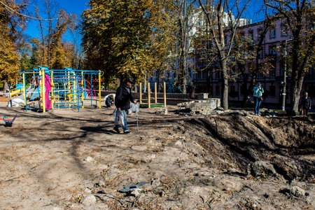 Aftermath of massive Russian missile attacks, a public garden in the city center was hit hard. Missiles hit in 4 places in the city of Kyiv. 9 people died and 36 people were injured. Russia threatens more strikes after missiles hit cities across Ukraineのeditorial素材