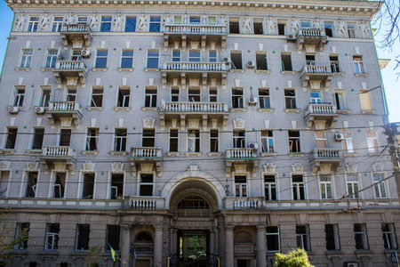Aftermath of massive Russian missile attacks, facade of historical buildings in downtown Kyiv was hit hard. Missiles hit in 4 places in the city of Kyiv. 9 people died and 36 people were injured. Russia threatens more strikes after missiles hit cities acrのeditorial素材