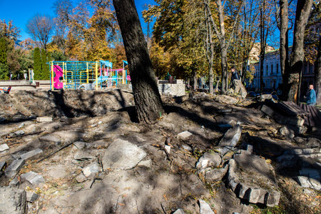 Aftermath of massive Russian missile attacks, a public garden in the city center was hit hard. Missiles hit in 4 places in the city of Kyiv. 9 people died and 36 people were injured. Russia threatens more strikes after missiles hit cities across Ukraineのeditorial素材