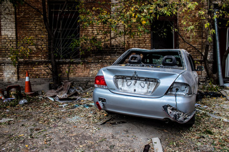 Aftermath of massive Russian missile attacks, cars around the Samsung office building was hit hard. The damage to the vehicles is considerable and several of them are destroyed.のeditorial素材