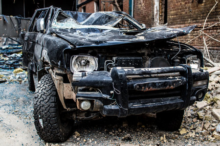 Aftermath of massive Russian missile attacks, cars around the Samsung office building was hit hard. The damage to the vehicles is considerable and several of them are destroyed.のeditorial素材