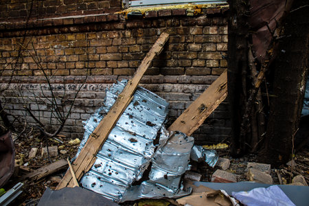 Aftermath of massive Russian missile attacks, debris littering the ground around the Samsung office building. The blast from the explosion sent shards of glass and metal in all directions causing extensive secondary damage, many people were seriously injuのeditorial素材