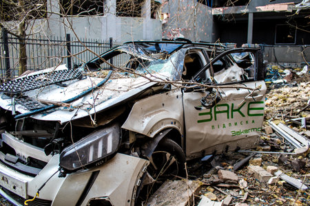 Aftermath of massive Russian missile attacks, cars around the Samsung office building was hit hard. The damage to the vehicles is considerable and several of them are destroyed.のeditorial素材