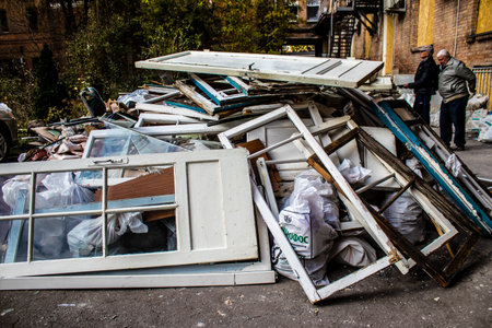 Aftermath of massive Russian missile attacks, debris littering the ground around the Samsung office building. The blast from the explosion sent shards of glass and metal in all directions causing extensive secondary damage, many people were seriously injuのeditorial素材