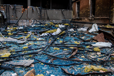 Aftermath of massive Russian missile attacks, debris littering the ground around the Samsung office building. The blast from the explosion sent shards of glass and metal in all directions causing extensive secondary damage, many people were seriously injuのeditorial素材