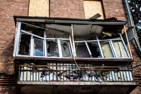 Aftermath of massive Russian missile attacks, debris littering the ground around the Samsung office building. The blast from the explosion sent shards of glass and metal in all directions causing extensive secondary damage, many people were seriously injuのeditorial素材