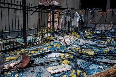 Aftermath of massive Russian missile attacks, debris littering the ground around the Samsung office building. The blast from the explosion sent shards of glass and metal in all directions causing extensive secondary damage, many people were seriously injuのeditorial素材