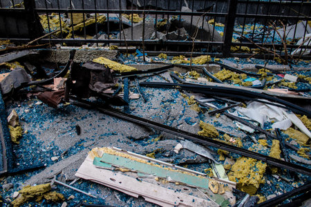 Aftermath of massive Russian missile attacks, debris littering the ground around the Samsung office building. The blast from the explosion sent shards of glass and metal in all directions causing extensive secondary damage, many people were seriously injuのeditorial素材
