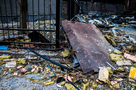 Aftermath of massive Russian missile attacks, debris littering the ground around the Samsung office building. The blast from the explosion sent shards of glass and metal in all directions causing extensive secondary damage, many people were seriously injuのeditorial素材