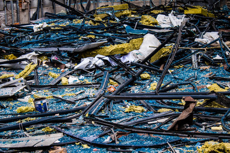 Aftermath of massive Russian missile attacks, debris littering the ground around the Samsung office building. The blast from the explosion sent shards of glass and metal in all directions causing extensive secondary damage, many people were seriously injuのeditorial素材