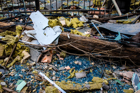 Aftermath of massive Russian missile attacks, debris littering the ground around the Samsung office building. The blast from the explosion sent shards of glass and metal in all directions causing extensive secondary damage, many people were seriously injuのeditorial素材