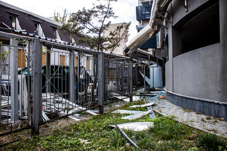 Aftermath of massive Russian missile attacks, debris littering the ground around the Samsung office building. The blast from the explosion sent shards of glass and metal in all directions causing extensive secondary damage, many people were seriously injuのeditorial素材