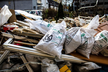 Aftermath of massive Russian missile attacks, debris littering the ground around the Samsung office building. The blast from the explosion sent shards of glass and metal in all directions causing extensive secondary damage, many people were seriously injuのeditorial素材