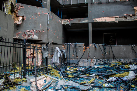 Aftermath of massive Russian missile attacks, debris littering the ground around the Samsung office building. The blast from the explosion sent shards of glass and metal in all directions causing extensive secondary damage, many people were seriously injuのeditorial素材