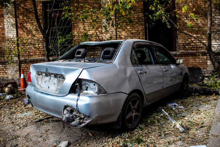 Aftermath of massive Russian missile attacks, cars around the Samsung office building was hit hard. The damage to the vehicles is considerable and several of them are destroyed.のeditorial素材