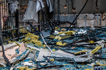 Aftermath of massive Russian missile attacks, debris littering the ground around the Samsung office building. The blast from the explosion sent shards of glass and metal in all directions causing extensive secondary damage, many people were seriously injuのeditorial素材