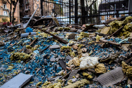 Aftermath of massive Russian missile attacks, debris littering the ground around the Samsung office building. The blast from the explosion sent shards of glass and metal in all directions causing extensive secondary damage, many people were seriously injuのeditorial素材
