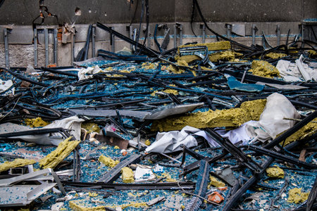 Aftermath of massive Russian missile attacks, debris littering the ground around the Samsung office building. The blast from the explosion sent shards of glass and metal in all directions causing extensive secondary damage, many people were seriously injuのeditorial素材