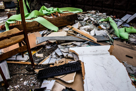 Aftermath of massive Russian missile attacks, debris littering the ground around the Samsung office building. The blast from the explosion sent shards of glass and metal in all directions causing extensive secondary damage, many people were seriously injuのeditorial素材