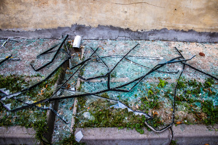 Aftermath of massive Russian missile attacks, debris littering the ground around the Samsung office building. The blast from the explosion sent shards of glass and metal in all directions causing extensive secondary damage, many people were seriously injuのeditorial素材