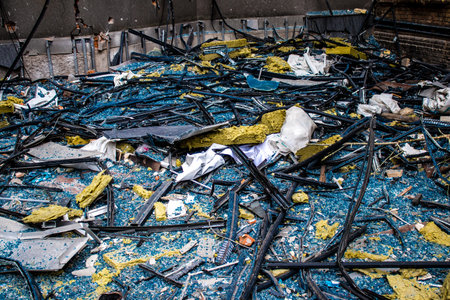 Aftermath of massive Russian missile attacks, debris littering the ground around the Samsung office building. The blast from the explosion sent shards of glass and metal in all directions causing extensive secondary damage, many people were seriously injuのeditorial素材