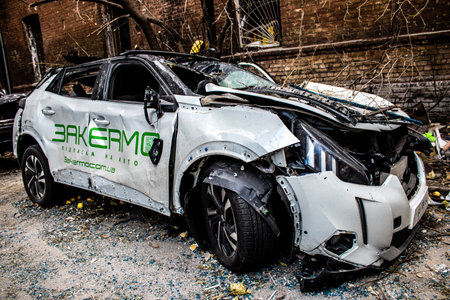 Aftermath of massive Russian missile attacks, cars around the Samsung office building was hit hard. The damage to the vehicles is considerable and several of them are destroyed.のeditorial素材