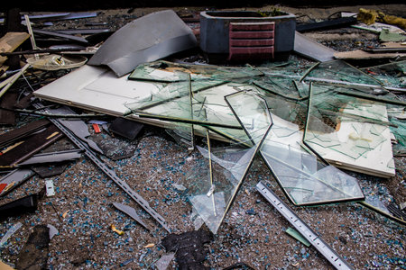 Aftermath of massive Russian missile attacks, debris littering the ground around the Samsung office building. The blast from the explosion sent shards of glass and metal in all directions causing extensive secondary damage, many people were seriously injuのeditorial素材