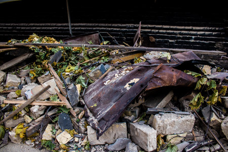 Aftermath of massive Russian missile attacks, debris littering the ground around the Samsung office building. The blast from the explosion sent shards of glass and metal in all directions causing extensive secondary damage, many people were seriously injuのeditorial素材