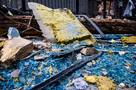 Aftermath of massive Russian missile attacks, debris littering the ground around the Samsung office building. The blast from the explosion sent shards of glass and metal in all directions causing extensive secondary damage, many people were seriously injuのeditorial素材