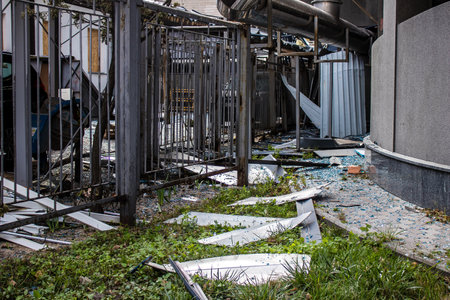Aftermath of massive Russian missile attacks, debris littering the ground around the Samsung office building. The blast from the explosion sent shards of glass and metal in all directions causing extensive secondary damage, many people were seriously injuのeditorial素材