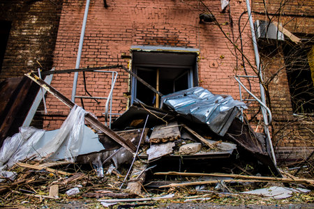 Aftermath of massive Russian missile attacks, debris littering the ground around the Samsung office building. The blast from the explosion sent shards of glass and metal in all directions causing extensive secondary damage, many people were seriously injuのeditorial素材