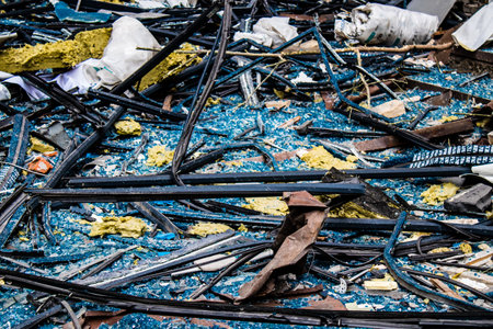 Aftermath of massive Russian missile attacks, debris littering the ground around the Samsung office building. The blast from the explosion sent shards of glass and metal in all directions causing extensive secondary damage, many people were seriously injuのeditorial素材