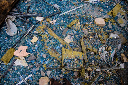 Aftermath of massive Russian missile attacks, debris littering the ground around the Samsung office building. The blast from the explosion sent shards of glass and metal in all directions causing extensive secondary damage, many people were seriously injuのeditorial素材