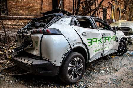 Aftermath of massive Russian missile attacks, cars around the Samsung office building was hit hard. The damage to the vehicles is considerable and several of them are destroyed.のeditorial素材