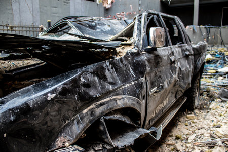 Aftermath of massive Russian missile attacks, cars around the Samsung office building was hit hard. The damage to the vehicles is considerable and several of them are destroyed.のeditorial素材