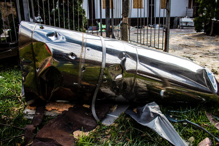 Aftermath of massive Russian missile attacks, debris littering the ground around the Samsung office building. The blast from the explosion sent shards of glass and metal in all directions causing extensive secondary damage, many people were seriously injuのeditorial素材